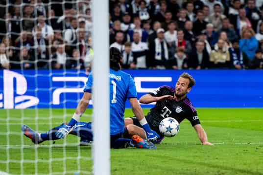 goalkeeper Kamil Grabara of Copenhagen and Harry Kane of