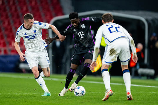 Lukas Lerager of Copenhagen and Alphonso Davies of Bayern