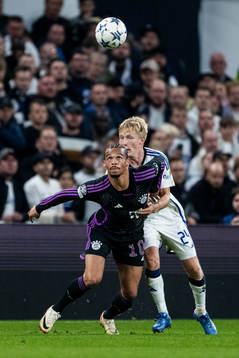 Leroy Sané of Bayern Munich and Birger Meling of Copenhagen