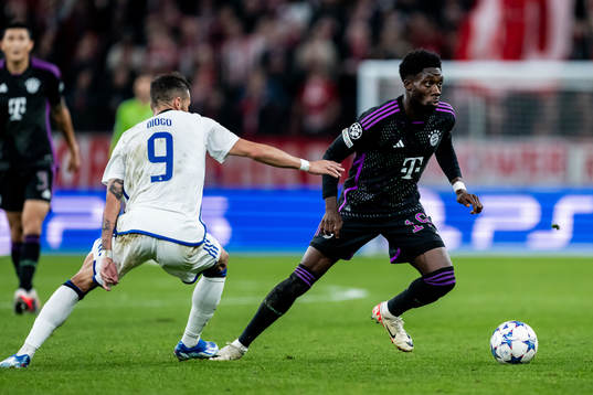 Diogo Goncalves of Copenhagen and Alphonso Davies of Bayern