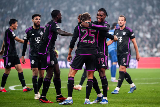 Thomas Muller and Mathys Tel of Bayern Munich celebrate