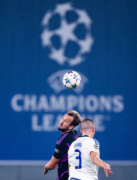 Harry Kane of Bayern Munich and Denis Vavro of Copenhagen