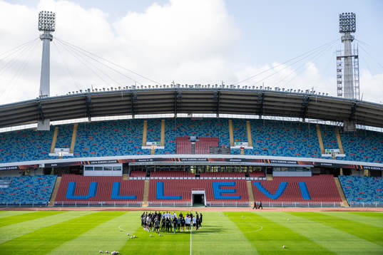 Players and staff gather