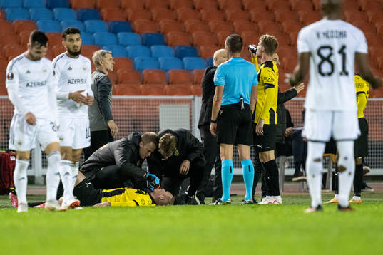 Mikkel Rygaard Jensen of Häcken receives medical treatment