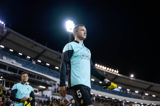 Tobias Sana and Even Hovland of Häcken enter the pitch