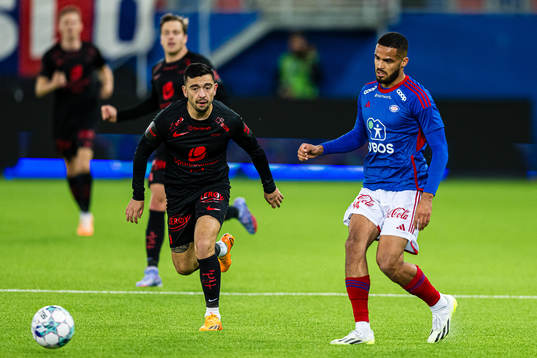 Niklas Castro of Brann and Aaron Kiil Olsen of Vålerenga