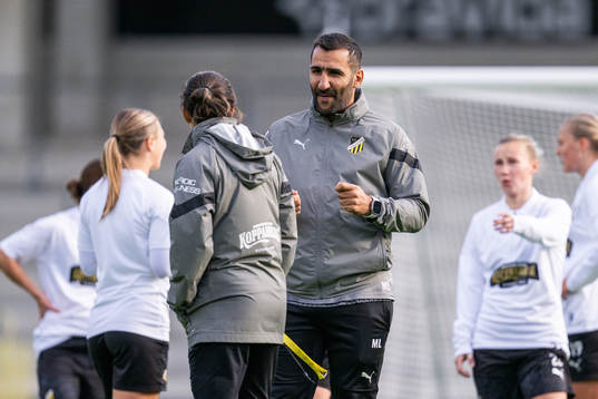 Head coach Mak Lind and assistant coach Bri Campos