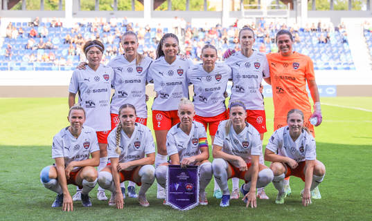 Players of Rosengård pose for a team picture