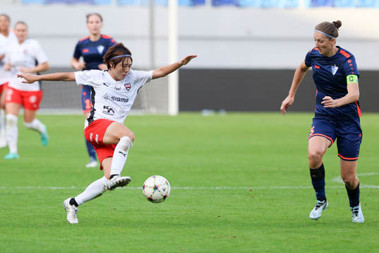 Mai Kadowaki of Rosengård and Violeta Slovic of Spartak