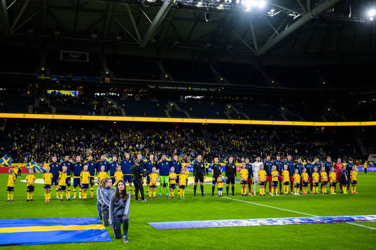 Players of Sweden and Moldova at lineup ahead the