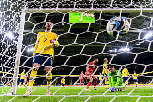 Linus Wahlqvist Egnell and goalkeeper Kristoffer Nordfeldt