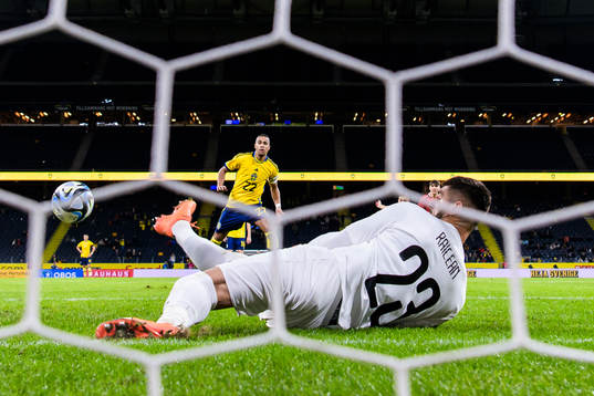 Goalkeeper Dorian Railean of Moldova saves a penalty by