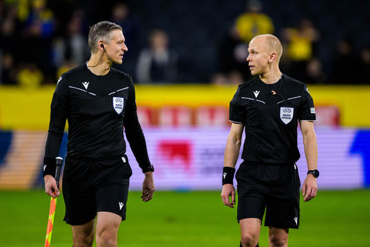 Assistant referee Jukka Honkanen and referee Antti Munukka