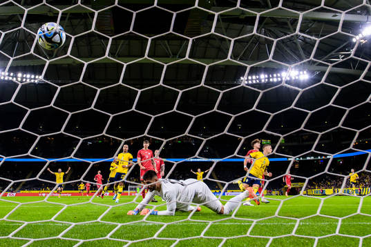 Jesper Karlsson of Sweden scores 1-0 behind  Dorian Railean