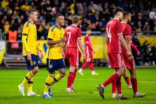 Robin Quaison and Jesper Karlsson of Sweden celebrating 3-1
