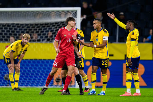 Artur Craciun of Moldova  receives a red card