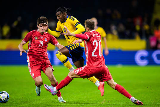 Anthony Elanga of Sweden and Victor Bogaciuc and Sergiu