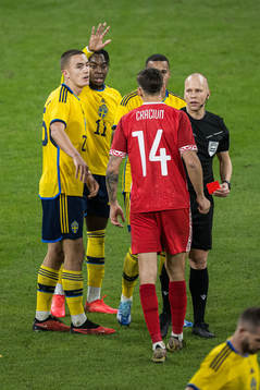 Artur Craciun of Moldova receives a red card from Referee