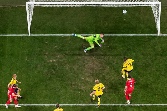 Ion Nicolaescu of Moldova scores the 2-1 goal behind
