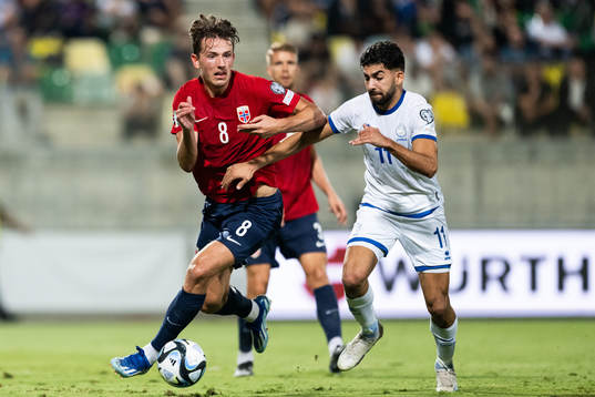 Sander Berge of Norway and Andronikos Kakoulli of Cyprus