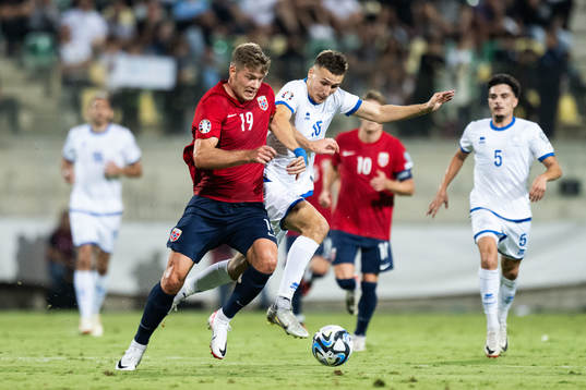 Alexander Sørloth of Norway and Danilo Spoljaric of Cyprus