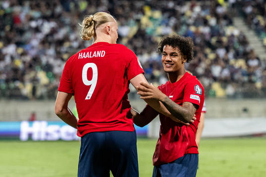 Erling Braut Haaland of Norway celebrates with Oscar Bobb