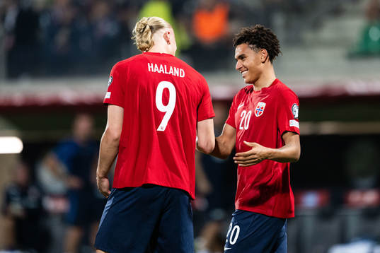 Erling Braut Haaland of Norway celebrates with Antonio Nusa
