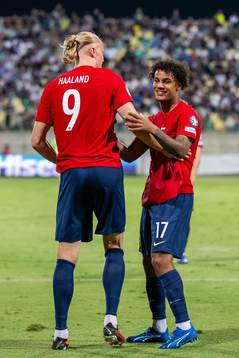 Erling Braut Haaland of Norway celebrates with teammate