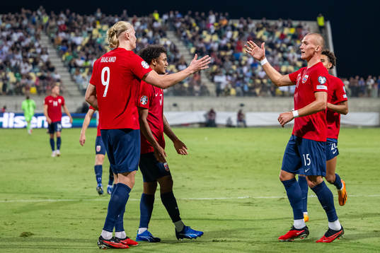 Erling Braut Haaland of Norway celebrates with teammate Leo