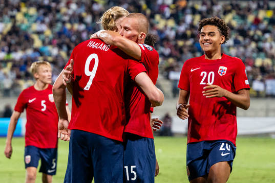 Erling Braut Haaland of Norway celebrates with teammates