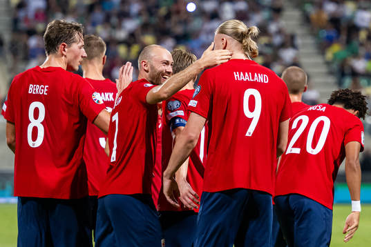 Erling Braut Haaland of Norway celebrates with teammate