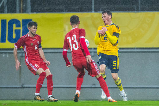 Vicu Bulmaga and Andrei Motoc of Moldova defend against