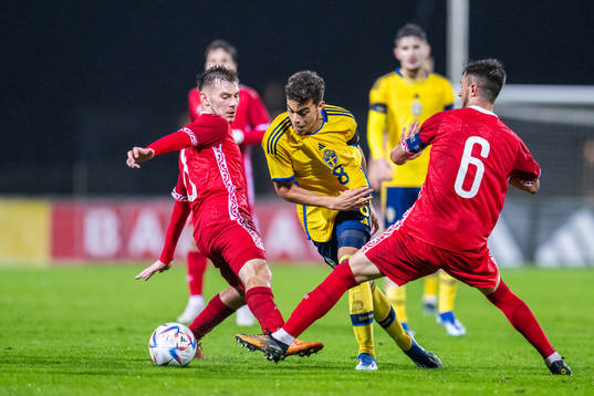 Yasin Ayari of Sweden competes for the ball with Vicu
