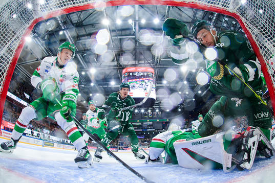 Rögles Adam Engström och Färjestads Joakim Nygård och