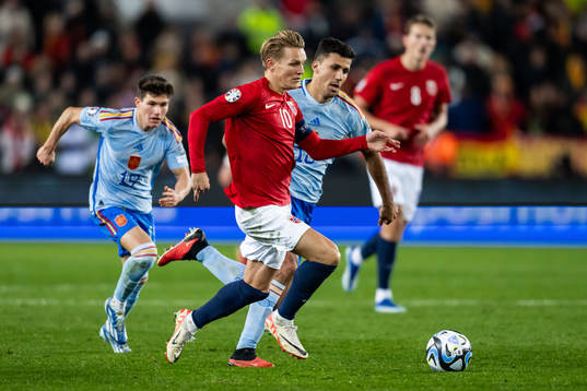 Fran Garcia of Spain and Martin Ødegaard of Norway