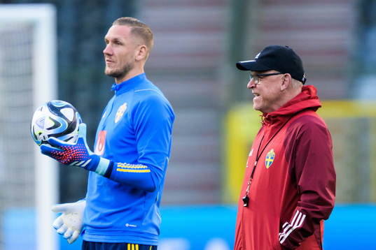 Goalkeeper Robin Olsen and head coach Janne Andersson of