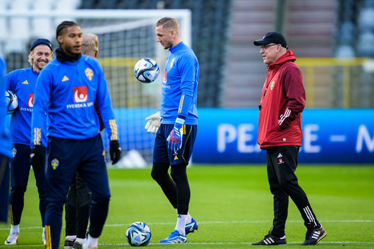 Emil Forsberg, goalkeeper Robin Olsen and head coach Janne
