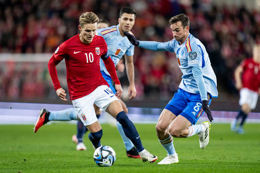 Martin Ødegaard of Norway and Fabián Ruiz of Spain