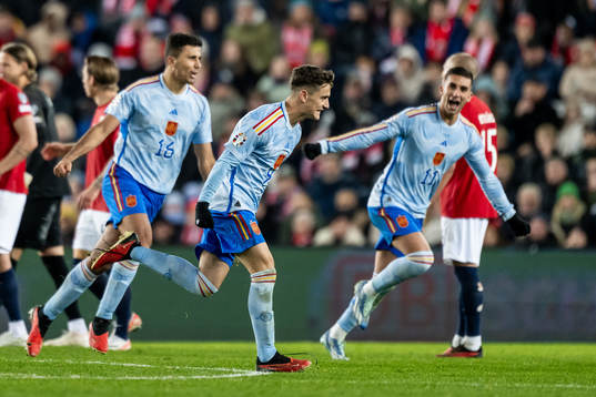 Gavi of Spain celebrates