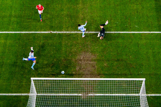 Álvaro Morata of Spain scores a disallowed goal behind