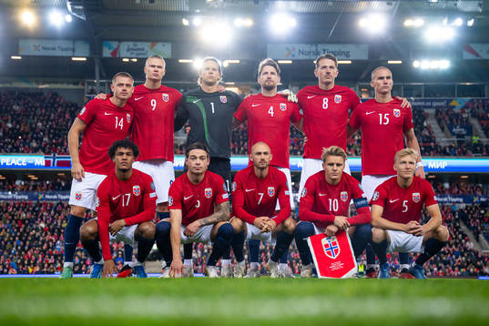 The starting eleven of Norway pose for a team photo