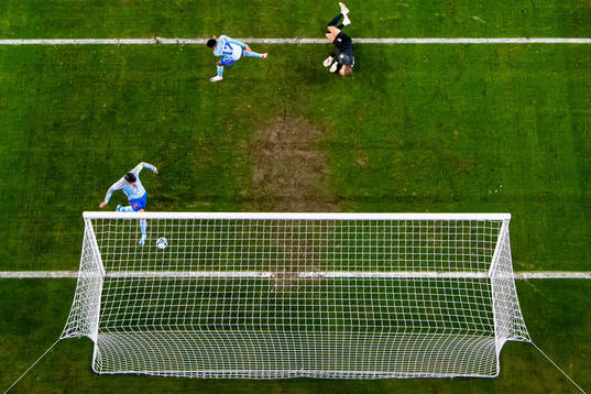 Álvaro Morata of Spain scores a disallowed goal behind