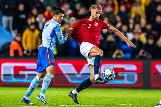 Alvaro Morata of Spain and Kristoffer Ajer of Norway