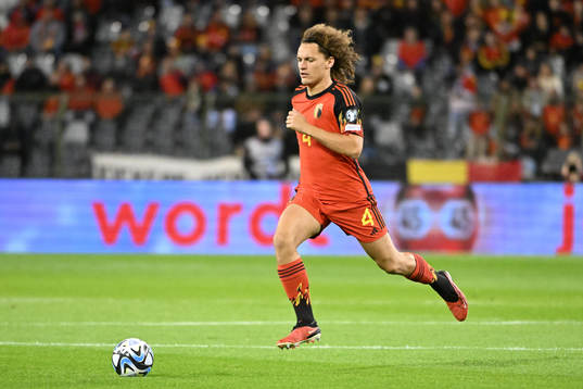Wout Faes of Belgium in action with the ball
