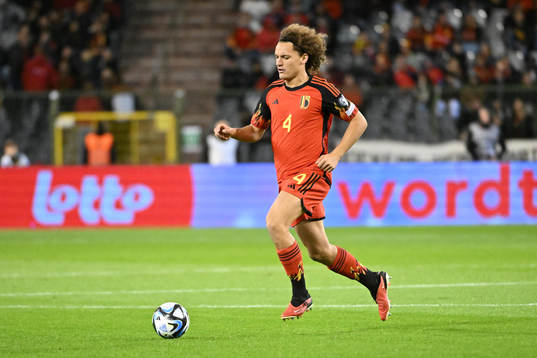 Wout Faes of Belgium in action with the ball