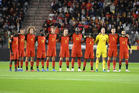 Players of Belgium pay respect to war victims in the world