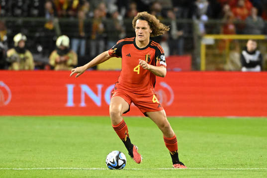 Wout Faes of Belgium in action with the ball