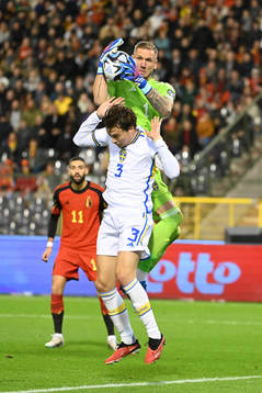 Robin Olsen of Sweden battles for the ball with Victor