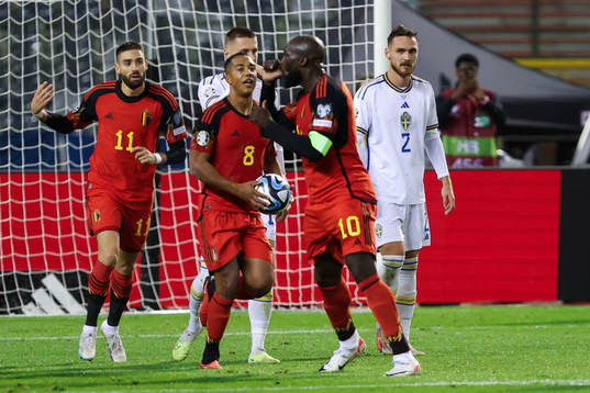 Romelu Lukaku of Belgium scores a penalty and celebrates