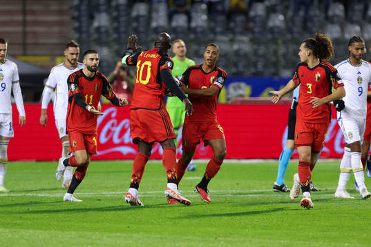 Romelu Lukaku of Belgium scores a penalty and celebrates